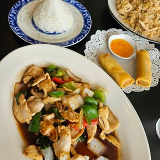 Thai Basil served with 1 Crispy Veg Roll