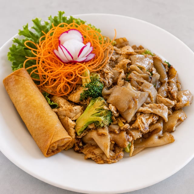 Pad See Ew served with 1 Crispy Veg Roll.