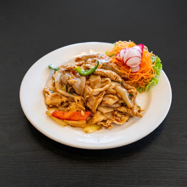 Drunken Noodles served with 1 Crispy Veg Roll.