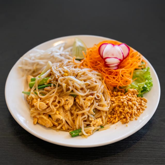 Pad Thai served with 1 Crispy Veg Roll.