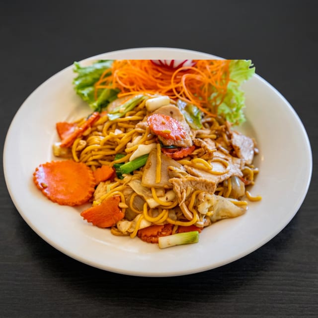Pad Lo Mein Noodles served with 1 Crispy Veg Roll.
