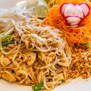 Pad Thai served with 1 Crispy Veg Roll
